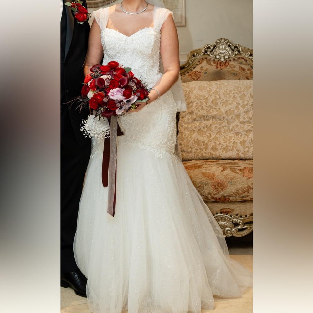 Stunning mermaid wedding dress, all hand beaded bodice.